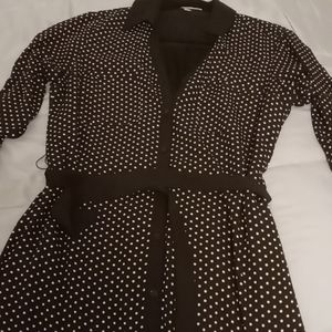 Black covered in white polka dots dress